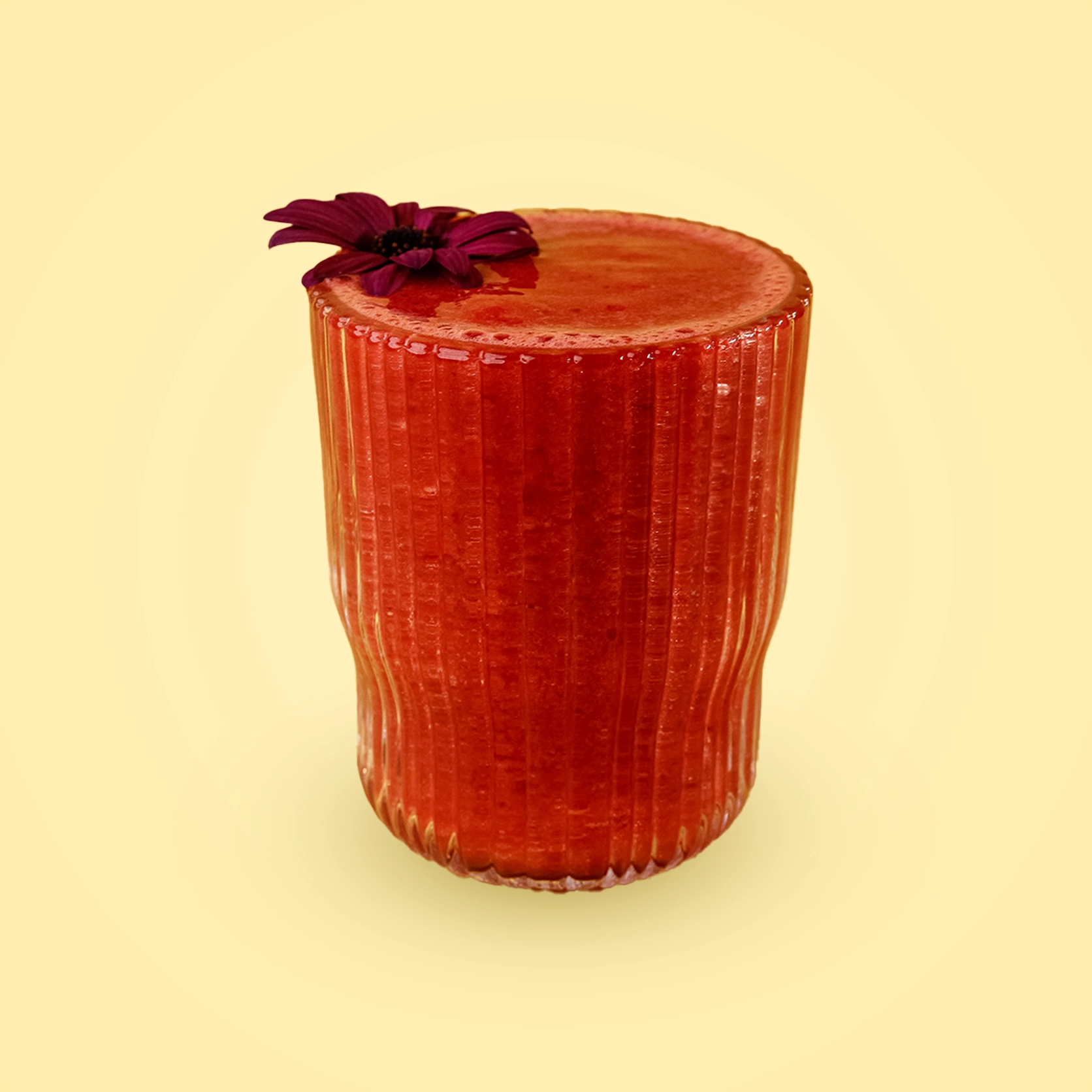 Orange smoothie with cherry and strawberry